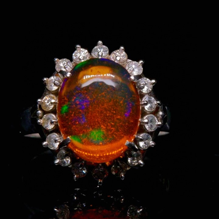 14k Gold 3.45 Ctw Natural Opal & Diamond Ring: Ref:231046348 // gold content:14k gold // ring size:7. 25us // // main gemstone:opal // shape:oval // carat weight:3. 13ct // color:orange // treatment:natural // // adjacent gemstone 2 : diamond //