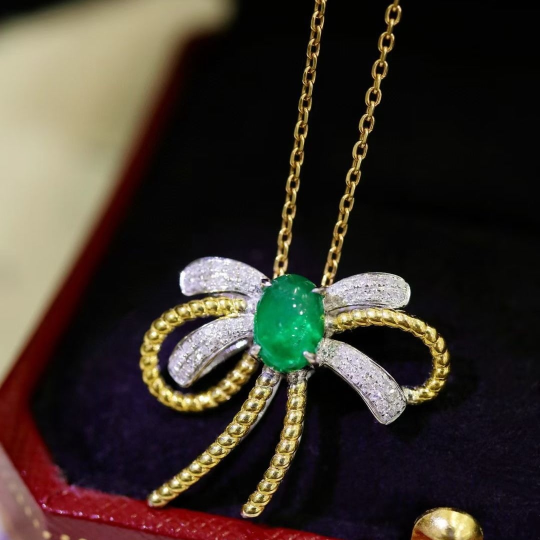 14k Gold 1.2 Ctw Natural Emerald & Diamond Pendant( Without Chain ): Ref:231046382 // gold content:14k gold // main gemstone:emerald // shape:oval // carat weight:1ct // color:green // treatment:natural // // adjacent gemstone 2 : diamond // shape:round // carat