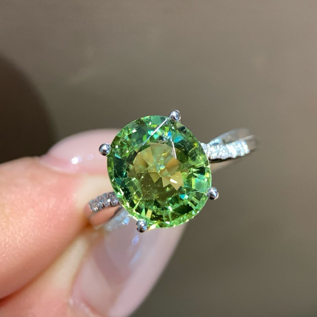 14k Gold 3.31 Ct Natural Tourmaline & Diamond Ring: Ref:231046396 // gold content:14k gold // ring size:7. 25us // // main gemstone:tourmaline // shape:oval // carat weight:3. 31ct // color:green // treatment:natural // // adjacent gemstone 2 :