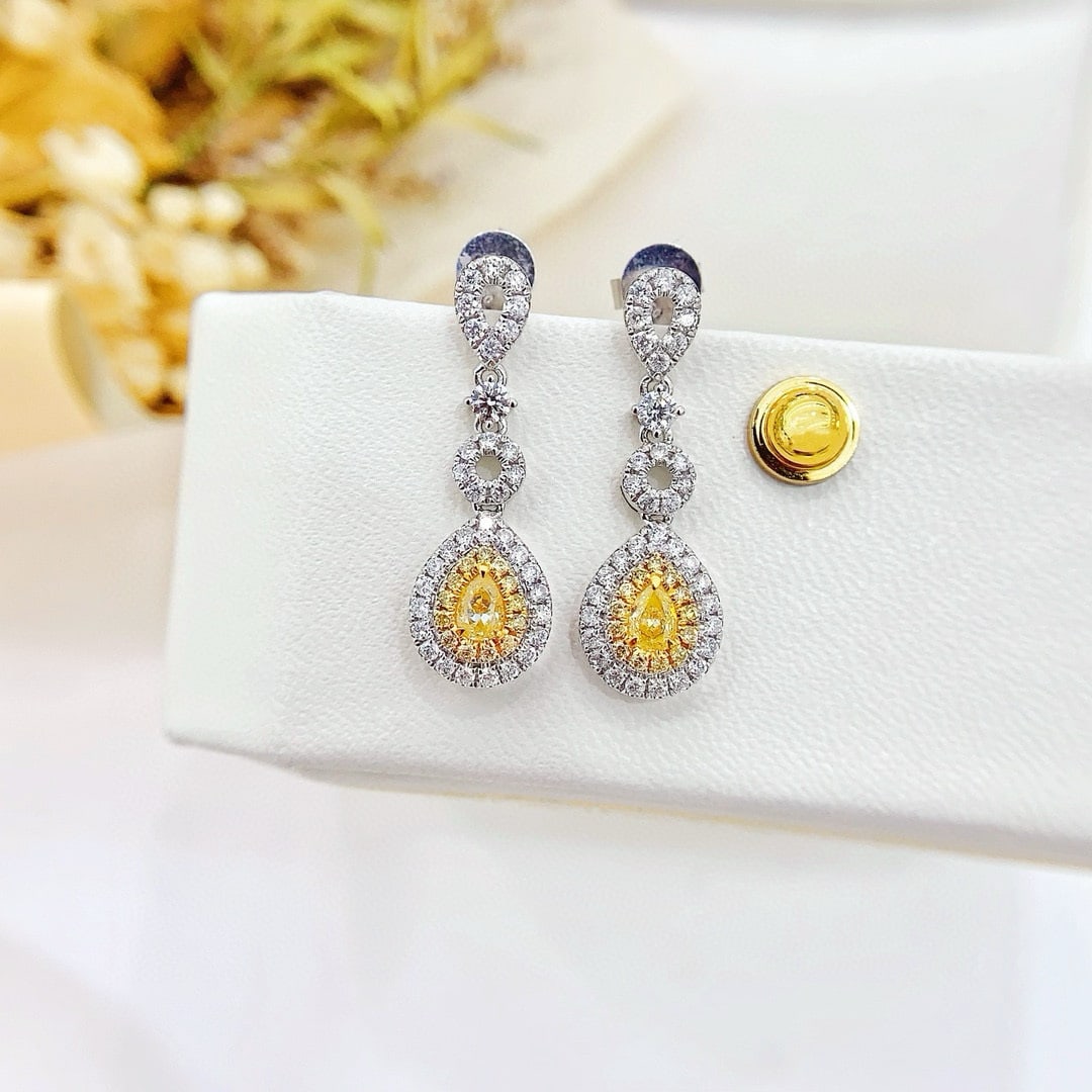 14k Gold 0.80 Ctw Natural Yellow Diamond & Diamond Earrings: Ref:231046407 // gold content:14k gold // main gemstone:yellow diamond // shape:pear // carat weight:0. 24ct // color:yellow // treatment:natural // // adjacent gemstone 2 : diamond // shape:round //