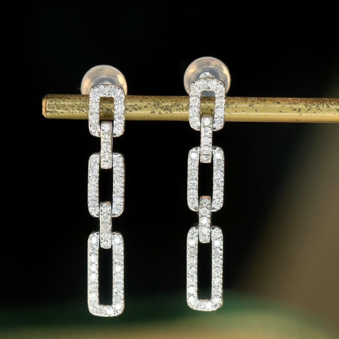 14k Gold 0.56 Ct Natural H Diamond Earrings: Ref:231046408 // gold content:14k gold // main gemstone:diamond // shape:round // carat weight:0. 56ct // clarity grade:vs-si // color:h // treatment:natural // cut grade:g // Low Estimate: 2400