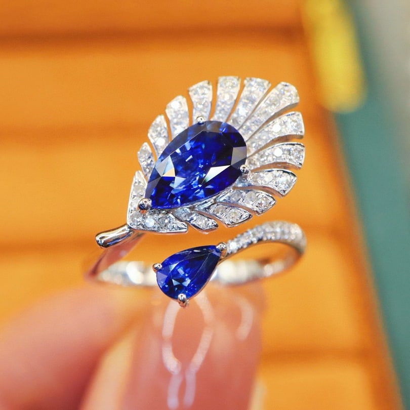 14k Gold 2.13 Ctw Natural Sapphire & Diamond Ring: Ref:231046417 // gold content:14k gold // ring size:7. 25us // // main gemstone:sapphire // shape:pear // carat weight:1. 86ct // color:royal blue // treatment:natural // // adjacent gemstone 2 :