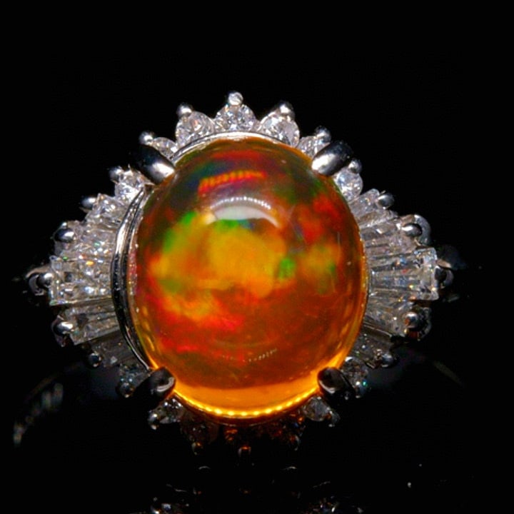 14k Gold 3.34 Ctw Natural Opal & Diamond Ring: Ref:231046432 // gold content:14k gold // ring size:7. 25us // // main gemstone:opal // shape:oval // carat weight:2. 92ct // color:orange // treatment:natural // // adjacent gemstone 2 : diamond // s