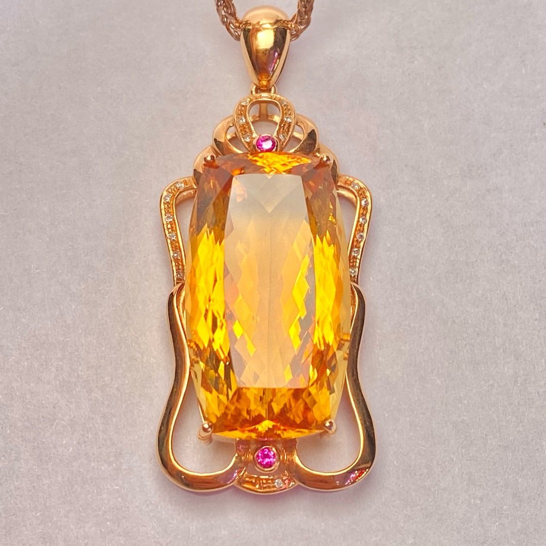 14k Gold 27.90 Ct Natural Citrine & Diamond & Ruby Pendant( Without Chain ): Ref:231046443 // gold content:14k gold // main gemstone:citrine // shape:cushion // carat weight:27. 90ct // color:yellow // treatment:natural // // adjacent gemstone 2 : diamond // number of