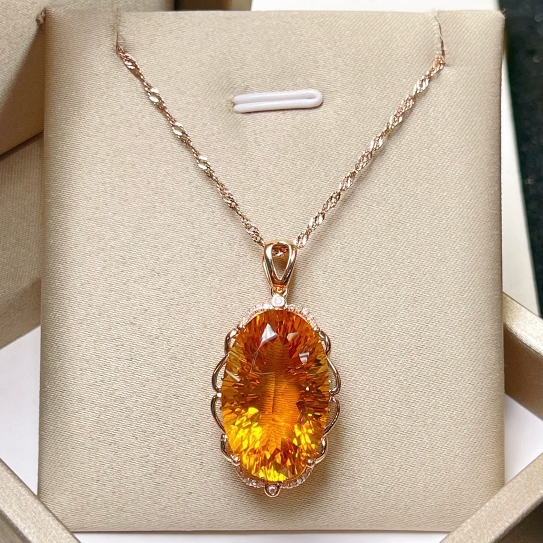 14k Gold 19.02 Ctw Natural Citrine & Diamond Pendant( Without Chain ): Ref:231046445 // gold content:14k gold // main gemstone:citrine // shape:oval // carat weight:18. 95ct // color:yellow // treatment:natural // // adjacent gemstone 2 : diamond // number of stones:22