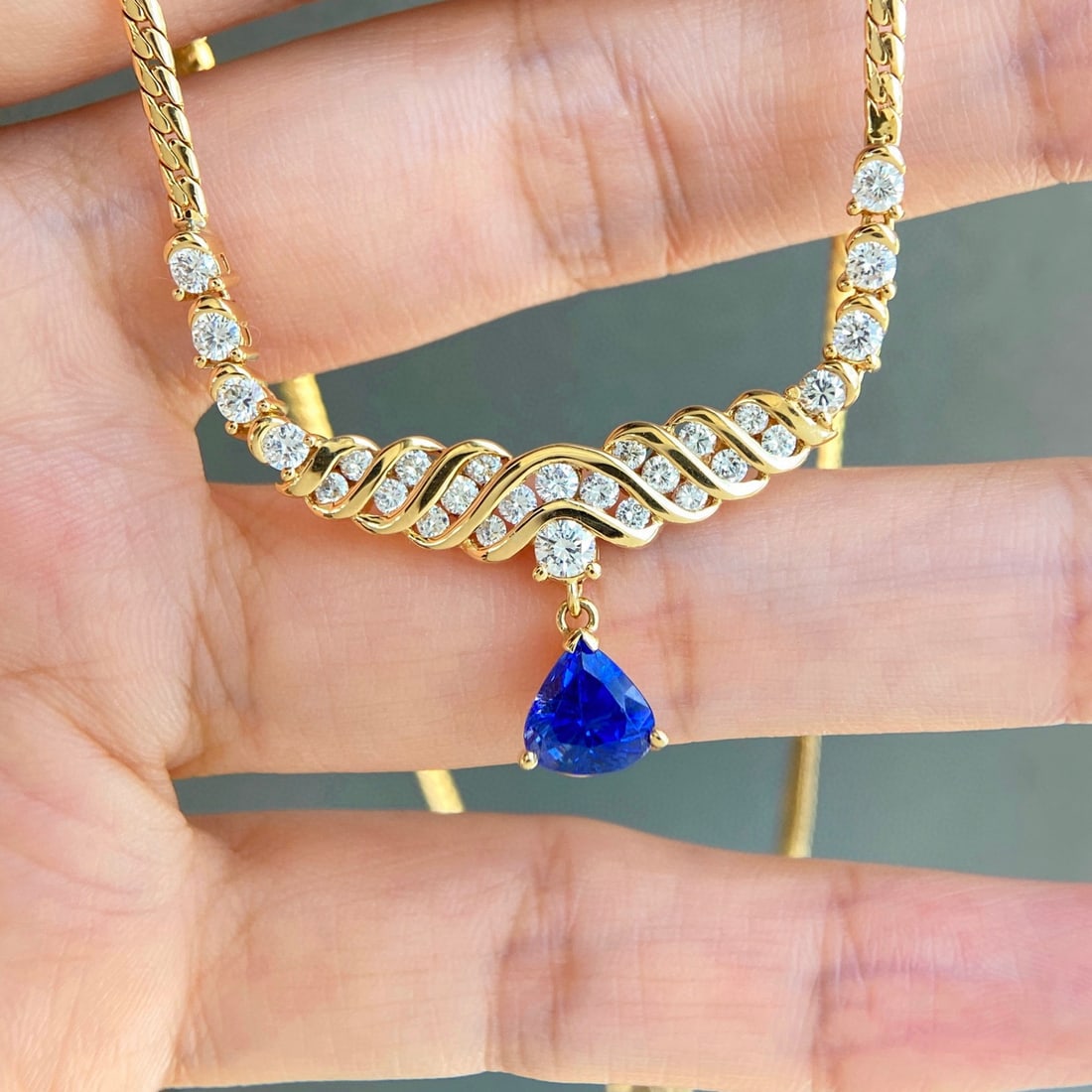 14k Gold 3.03 Ctw Natural Sapphire & Diamond Necklace: Ref:231046448 // gold content:14k gold // main gemstone:sapphire // shape:pear // carat weight:1. 80ct // color:royal blue // treatment:natural // // adjacent gemstone 2 : diamond // shape:round //