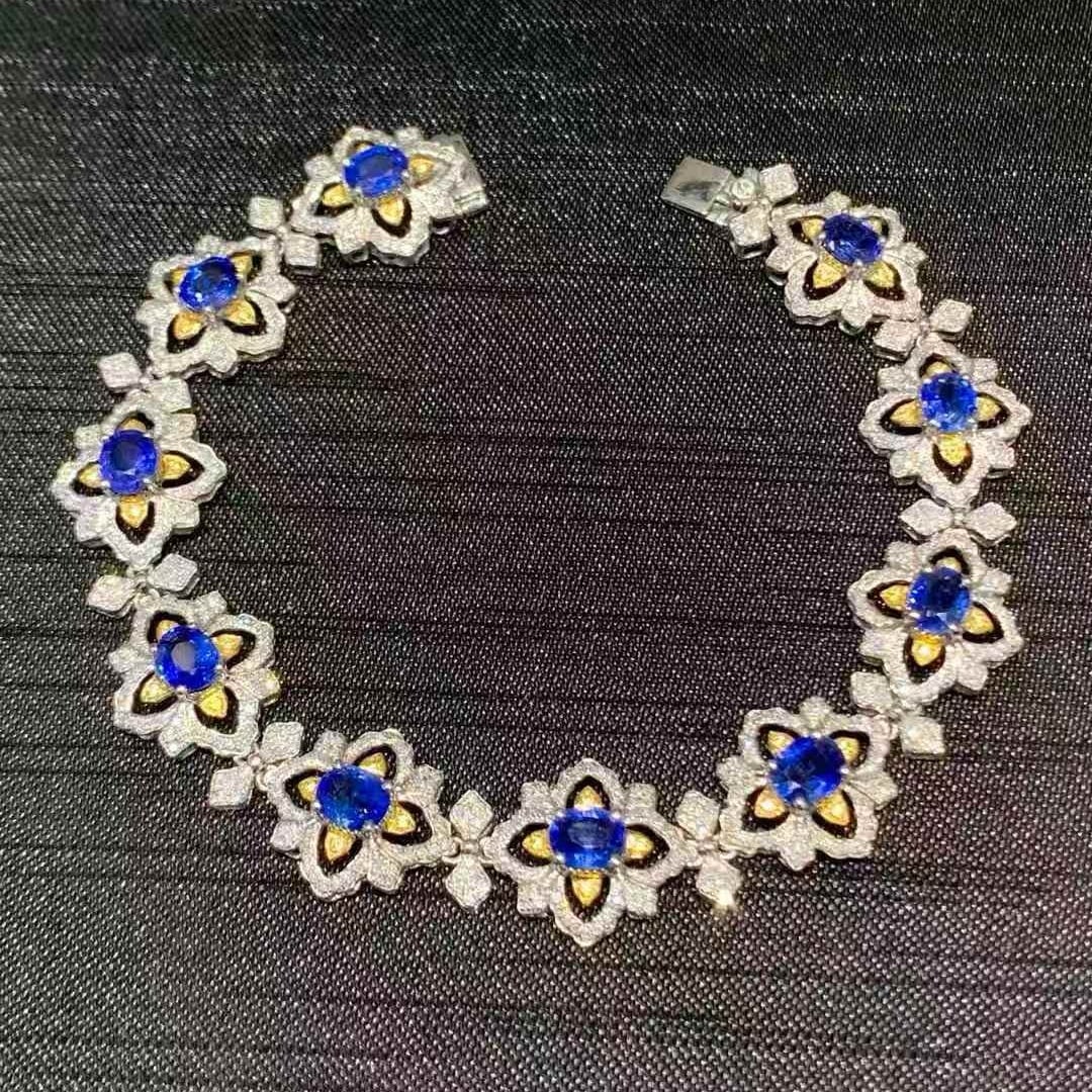 14k Gold 7.2 Ct Natural Sapphire & Diamond Bracelet: Ref:231047031 // gold content:14k gold // main gemstone:sapphire // shape:oval // carat weight:7. 2ct // color:blue // treatment:natural // // adjacent gemstone 2 : diamond // number of stones:701 //