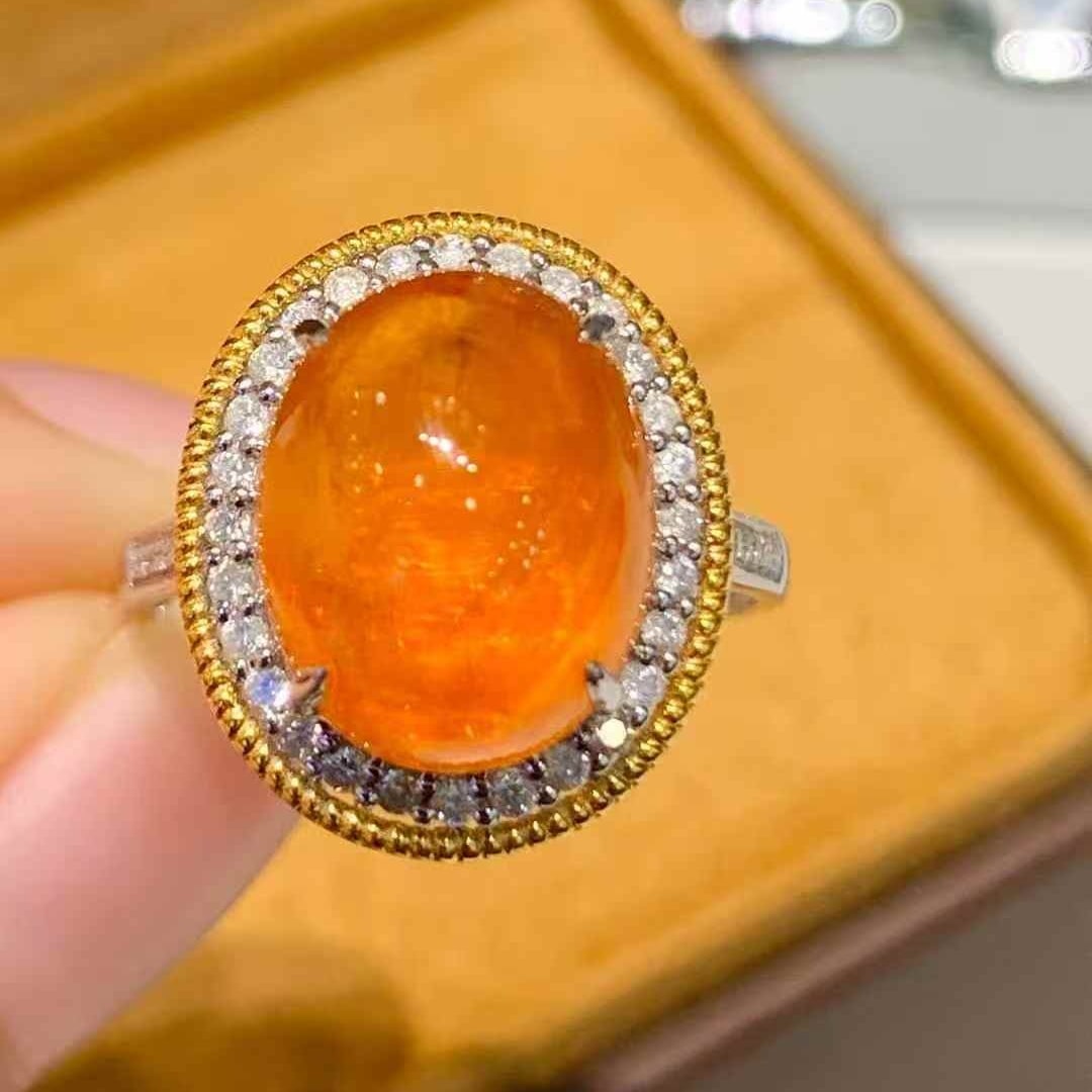 14k Gold 9 Ct Natural Spessartine & Diamond Ring: Ref:231047049 // gold content:14k gold // ring size:7. 25us // // main gemstone:spessartine // shape:oval // carat weight:9ct // color:orange // treatment:natural // // adjacent gemstone 2 : diamond