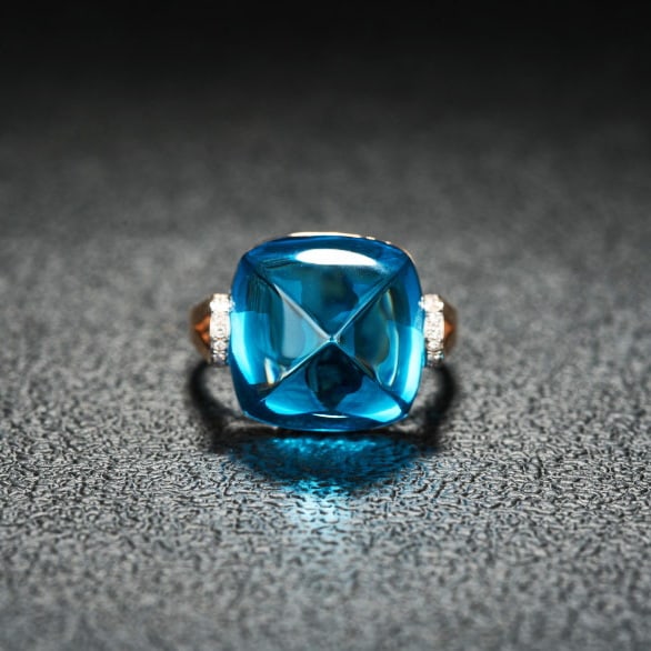 14k Gold 19.53 Ct Natural Topaz & Diamond Ring: Ref:231047082 // gold content:14k gold // ring size:7. 25us // // main gemstone:topaz // shape:sugar-loaf // carat weight:19. 53ct // color:blue // treatment:natural // // adjacent gemstone 2 :