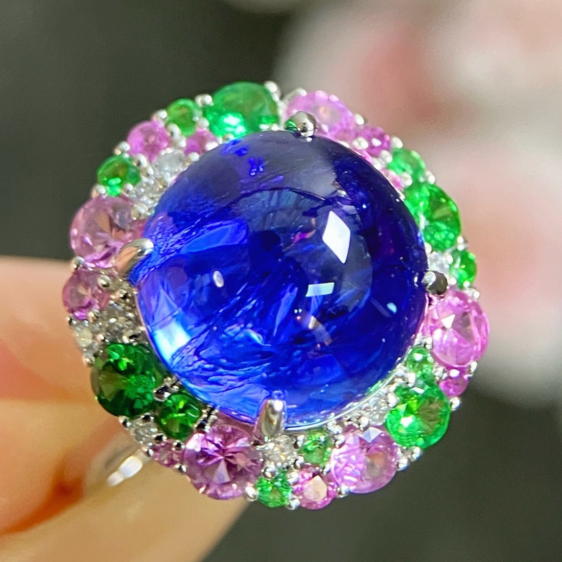 14k Gold 8.66 Ctw Natural Tanzanite & Tsavorite & Sapphire & Diamond Ring: Ref:231047089 // gold content:14k gold // ring size:7. 25us // // main gemstone:tanzanite // shape:oval // carat weight:7. 5ct // color:blue // treatment:natural // // adjacent gemstone 2 : tsavorite