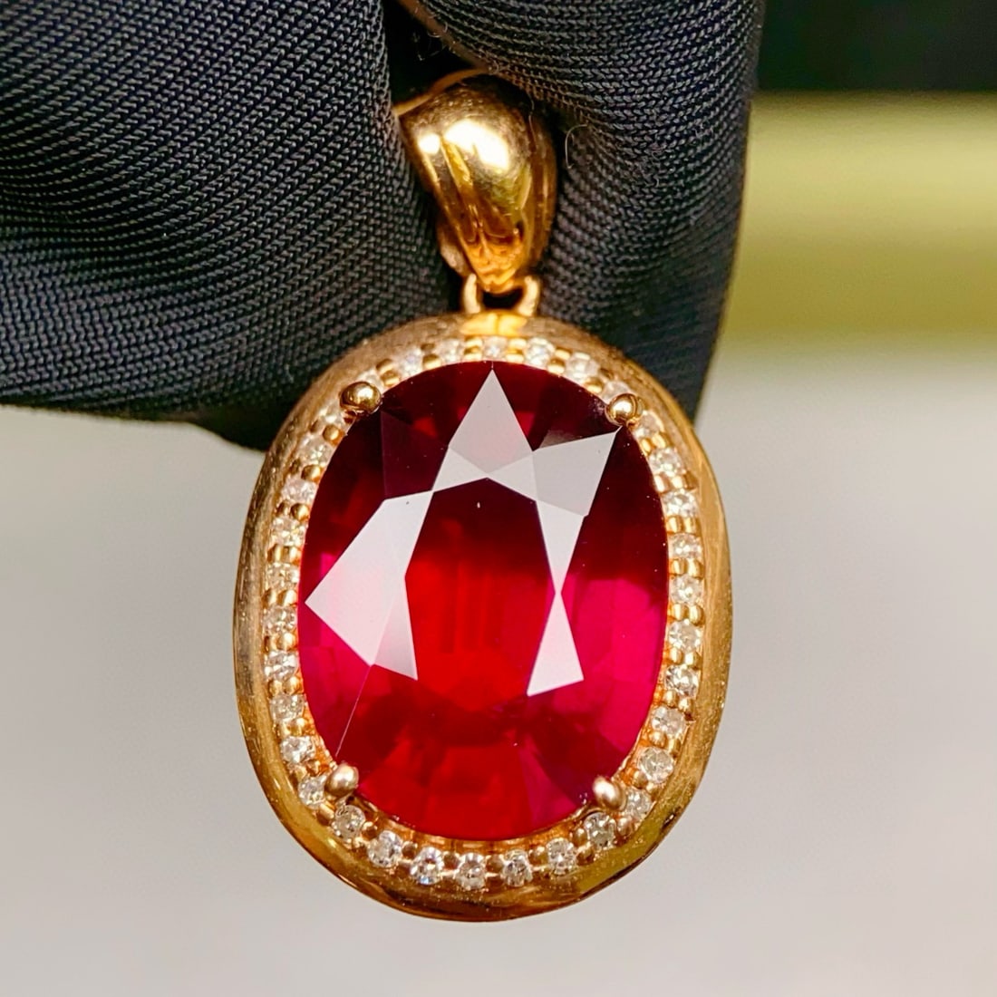 14k Gold 6.22 Ctw Natural Garnet & Diamond Pendant( Without Chain ): Ref:231047092 // gold content:14k gold // main gemstone:garnet // shape:oval // carat weight:6. 05ct // color:red // treatment:natural // // adjacent gemstone 2 : diamond // number of stones:34 //