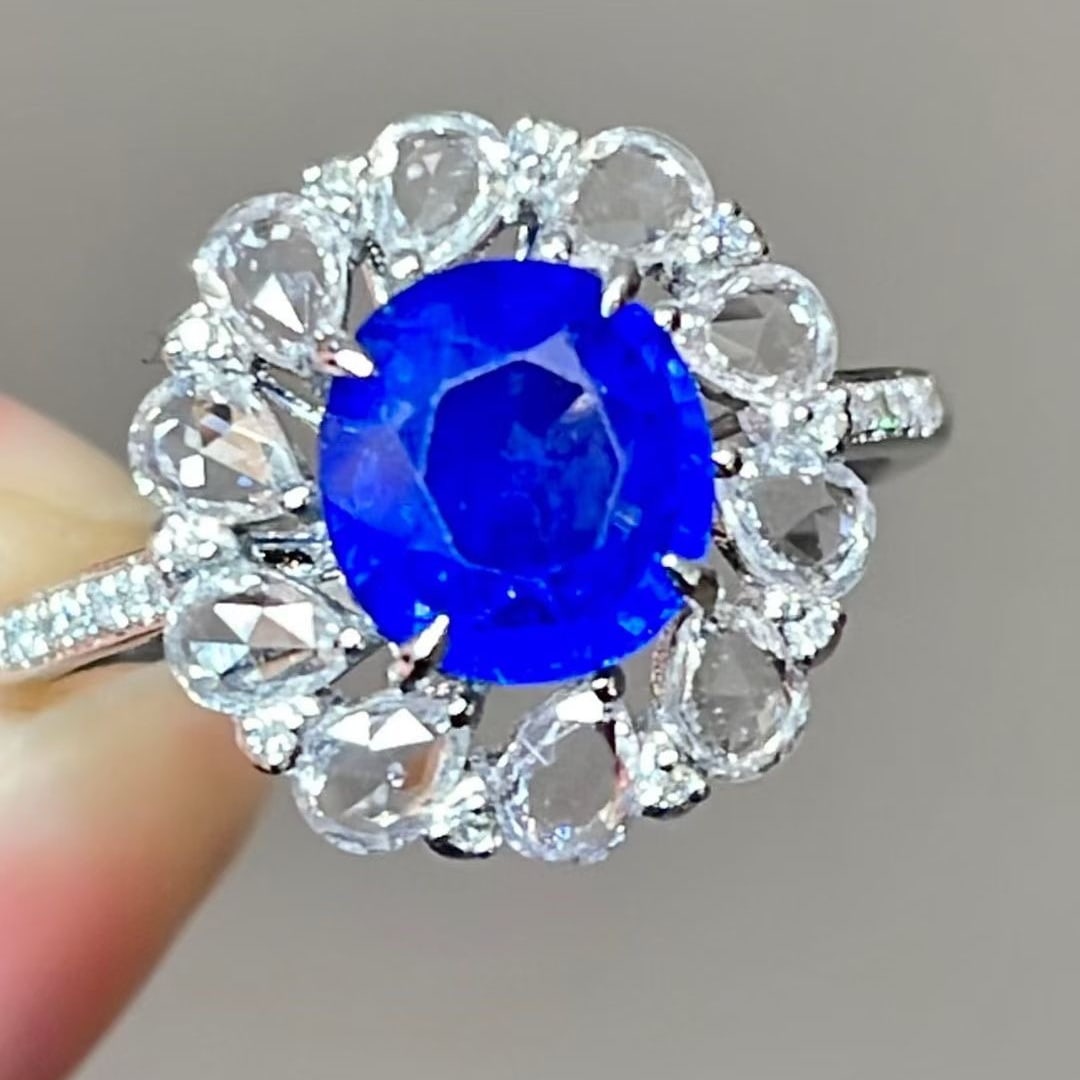 14k Gold 2.1 Ct Natural Sapphire & Diamond & Sapphire Ring: Ref:231047102 // gold content:14k gold // ring size:7. 25us // // main gemstone:sapphire // shape:oval // carat weight:2. 1ct // color:royal blue // treatment:natural // // adjacent gemstone 2 :