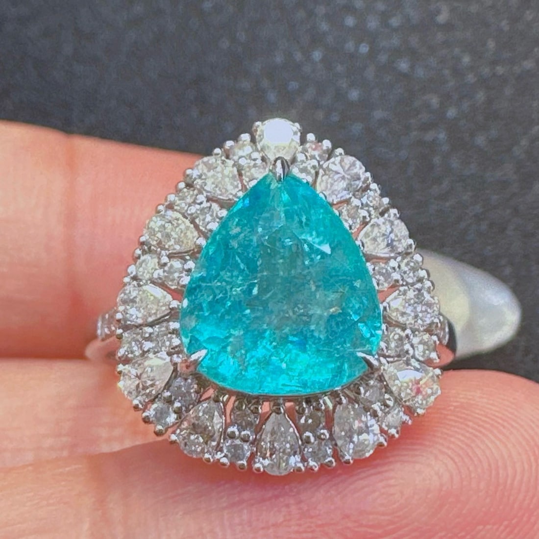 14k Gold 3.55 Ctw Natural Paraiba Tourmaline & Diamond Ring: Ref:231048129 // gold content:14k gold // ring size:7. 25us // // main gemstone:paraiba tourmaline // shape:pear // carat weight:2. 82ct // color:blue // treatment:natural // // adjacent gemstone 2 : 