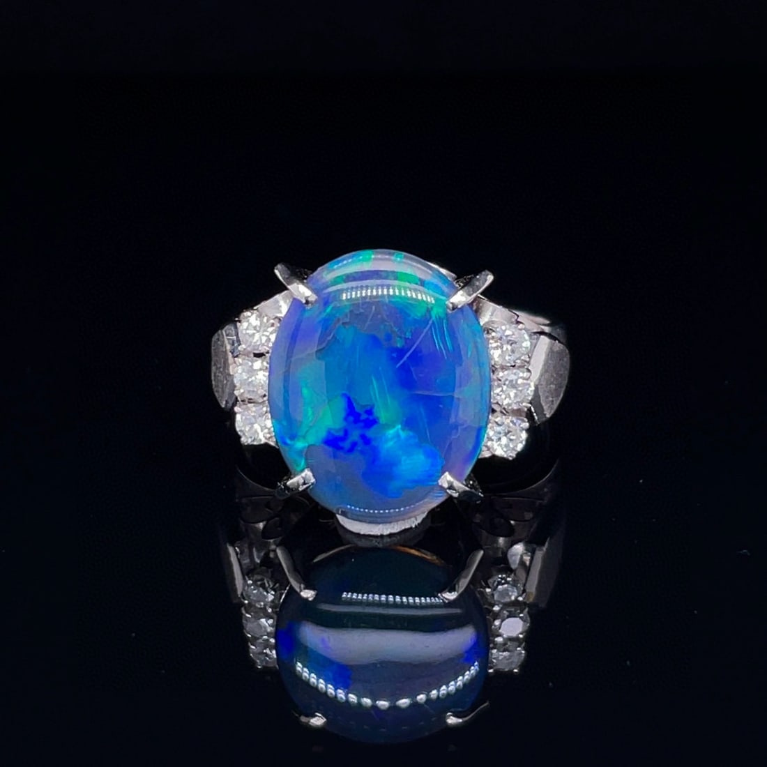 14k Gold 2.18 Ctw Natural Opal & Diamond Ring: Ref:231048168 // gold content:14k gold // ring size:7. 25us // // main gemstone:opal // shape:oval // carat weight:2ct // color:color // treatment:natural // // adjacent gemstone 2 : diamond //