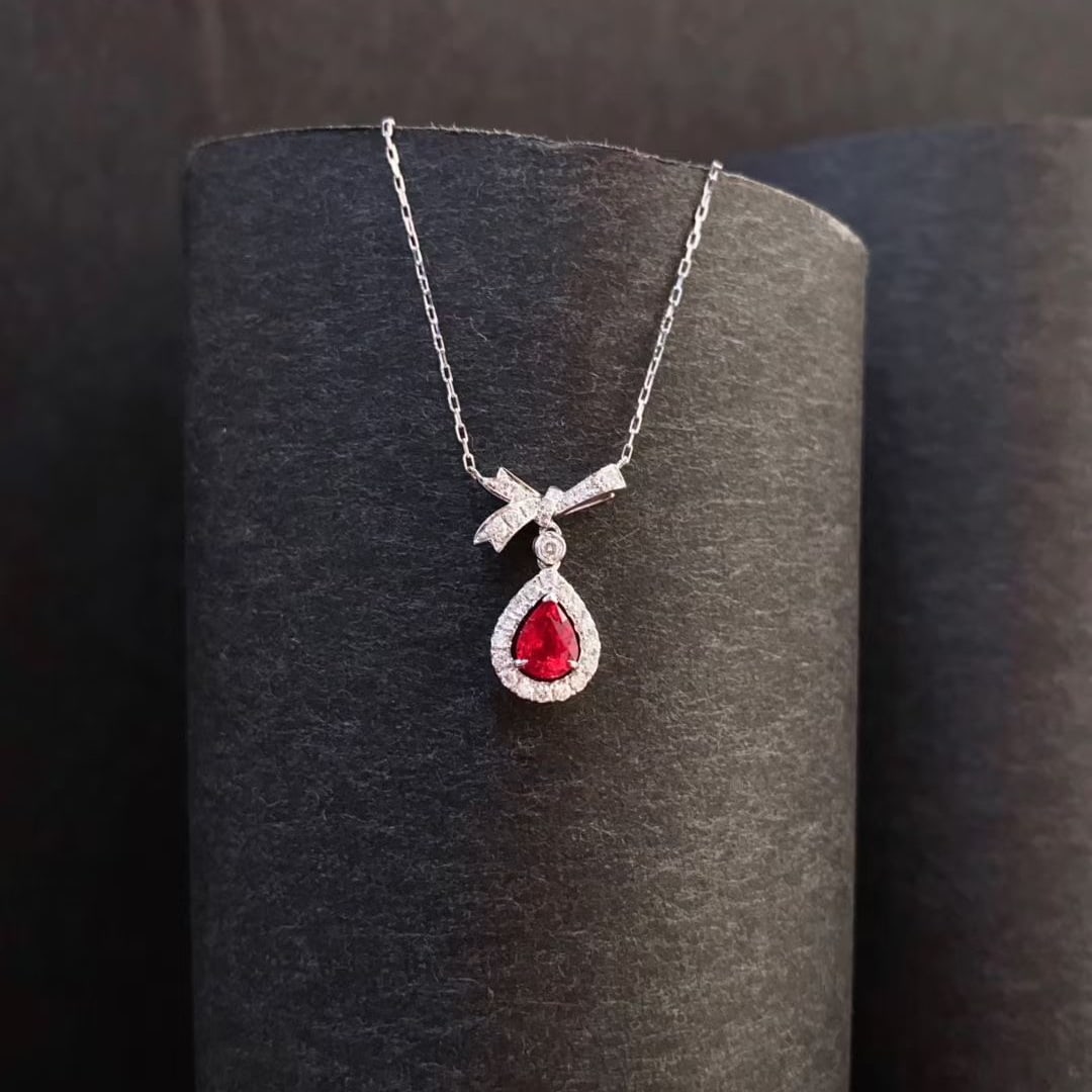 14k Gold 0.56 Ctw Natural Ruby & Diamond Necklace: Ref:231048199 // gold content:14k gold // main gemstone:ruby // shape:pear // carat weight:0. 4ct // color:red // treatment:natural // // adjacent gemstone 2 : diamond // shape:round // carat