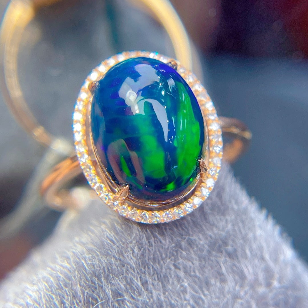 14k Gold 3.56 Ct Natural Opal & Diamond Ring: Ref:231048228 // gold content:14k gold // ring size:7. 25us // // main gemstone:opal // shape:oval // carat weight:3. 56ct // color:color // treatment:natural // // adjacent gemstone 2 : diamond // sh