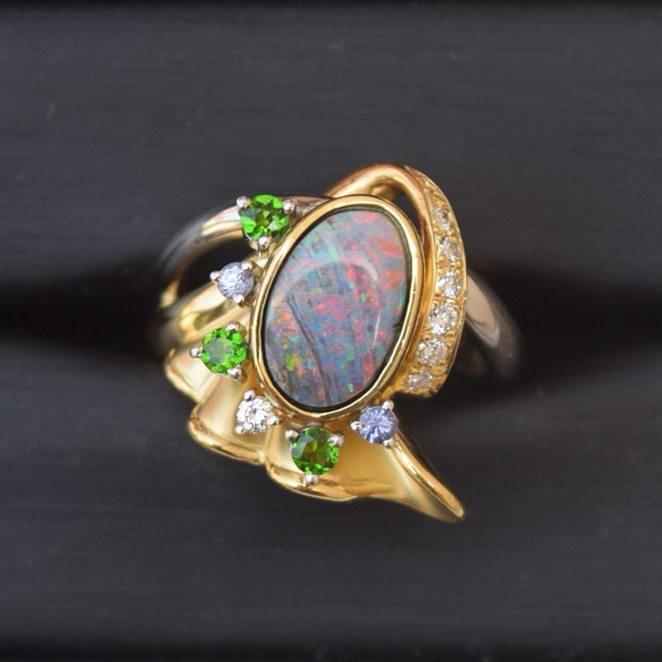 14k Gold 2.75 Ctw Natural Opal & Tourmaline & Tanzanite & Diamond Ring: Ref:231048270 // gold content:14k gold // ring size:7. 25us // // main gemstone:opal // shape:oval // carat weight:2. 55ct // color:color // treatment:natural // // adjacent gemstone 2 : tourmaline & 
