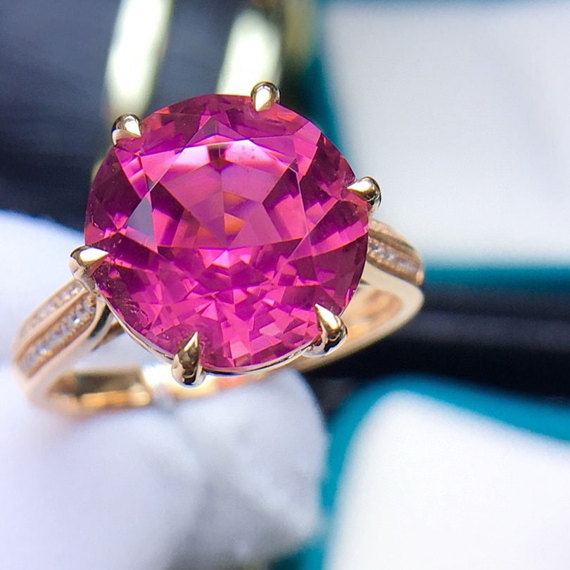 14k Gold 6.5 Ct Natural Tourmaline & Diamond Ring: Ref:231048409 // gold content:14k gold // ring size:7. 25us // // main gemstone:tourmaline // shape:round // carat weight:6. 5ct // color:red // treatment:natural // cut grade:g // // adjacent