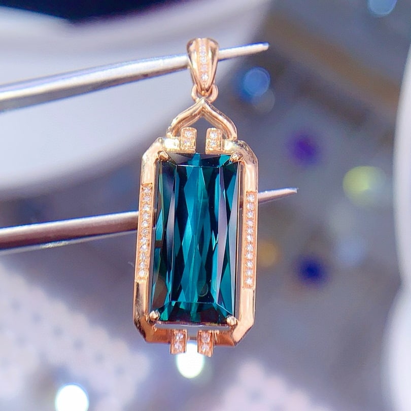 14k Gold 6.0 Ctw Natural Tourmaline & Diamond Pendant( Without Chain ): Ref:231048410 // gold content:14k gold // main gemstone:tourmaline // shape:octagonal // carat weight:5. 9ct // color:blue // treatment:natural // // adjacent gemstone 2 : diamond // shape:round // ca