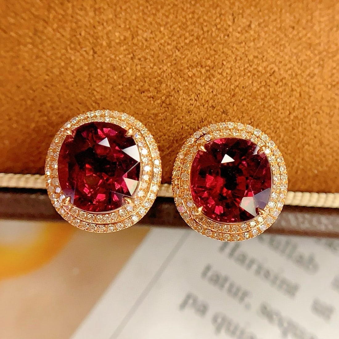 14k Gold 5 Ct Natural Tourmaline & Diamond Earrings: Ref:231048412 // gold content:14k gold // main gemstone:tourmaline // shape:oval // carat weight:5ct // color:red // treatment:natural // // adjacent gemstone 2 : diamond // number of stones:142 //