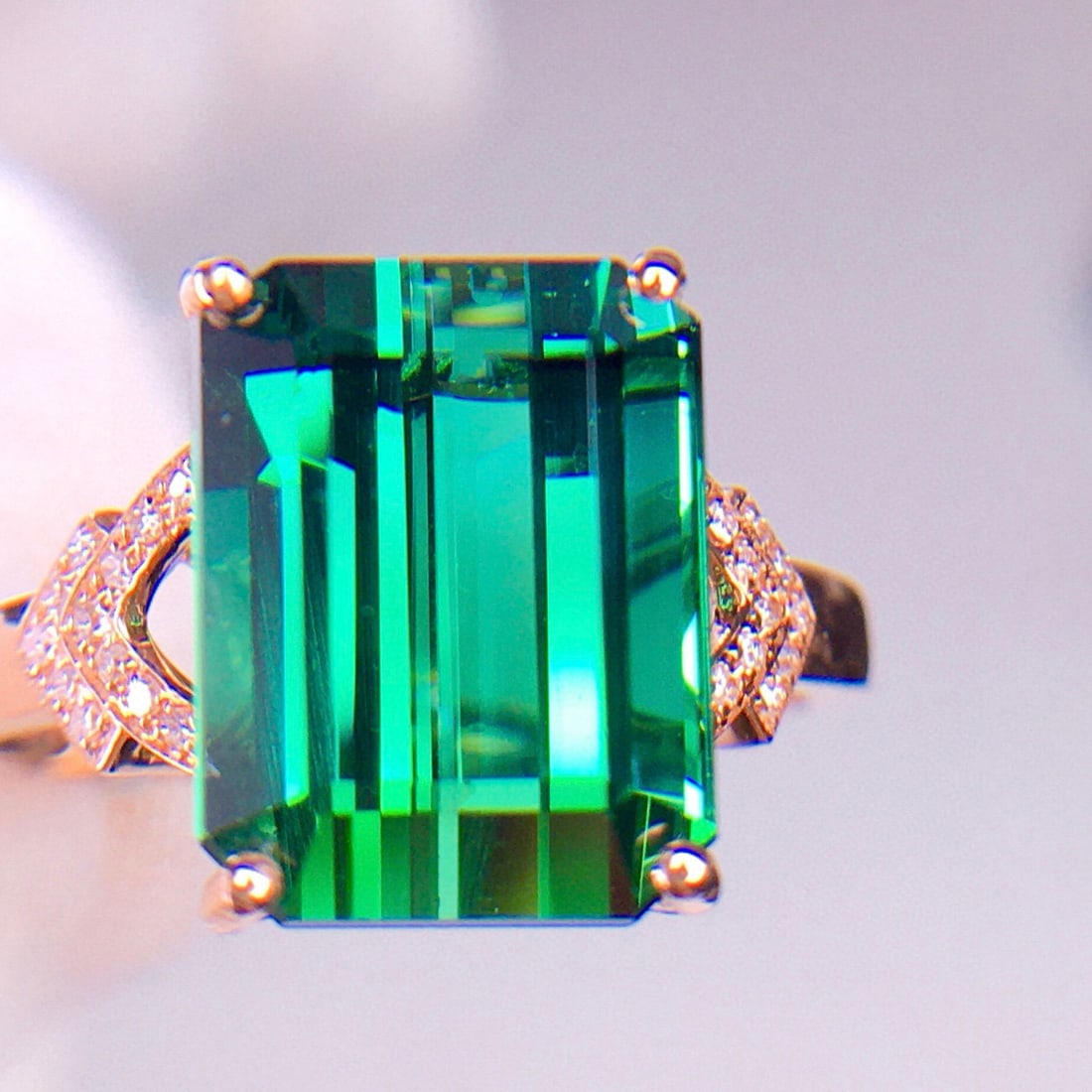 14k Gold 5.28 Ct Natural Tourmaline & Diamond Ring: Ref:231048417 // gold content:14k gold // ring size:7. 25us // // main gemstone:tourmaline // shape:octagonal // carat weight:5. 28ct // color:green // treatment:natural // // adjacent gemstone 2 : di
