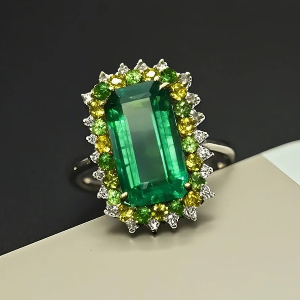 14k Gold 4.81 Ctw Natural Emerald & Diamond Ring: Ref:231051002 // gold content:14k gold // ring size:7. 25us // // main gemstone:emerald // shape:octagonal // carat weight:4. 51ct // color:green // treatment:natural // // adjacent gemstone 2 : diamo