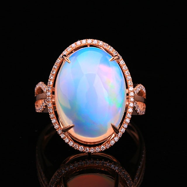 14k Gold 11.15 Ctw Natural Opal & Diamond Ring: Ref:231051032 // gold content:14k gold // ring size:7. 25us // // main gemstone:opal // shape:oval // carat weight:10. 87ct // color:white // treatment:natural // // adjacent gemstone 2 : diamond // n