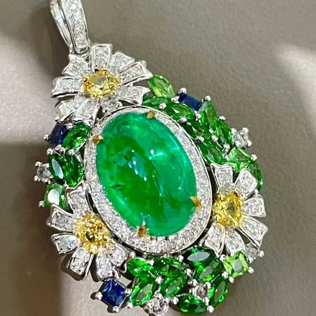14k Gold 2.78 Ct Natural Emerald & Diamond & Sapphire & Tsavorite Pendant( Without Chain ): Ref:231051150 // gold content:14k gold // main gemstone:emerald // shape:oval // carat weight:2. 78ct // color:green // treatment:natural // // adjacent gemstone 2 : diamond // shape:round // clarity