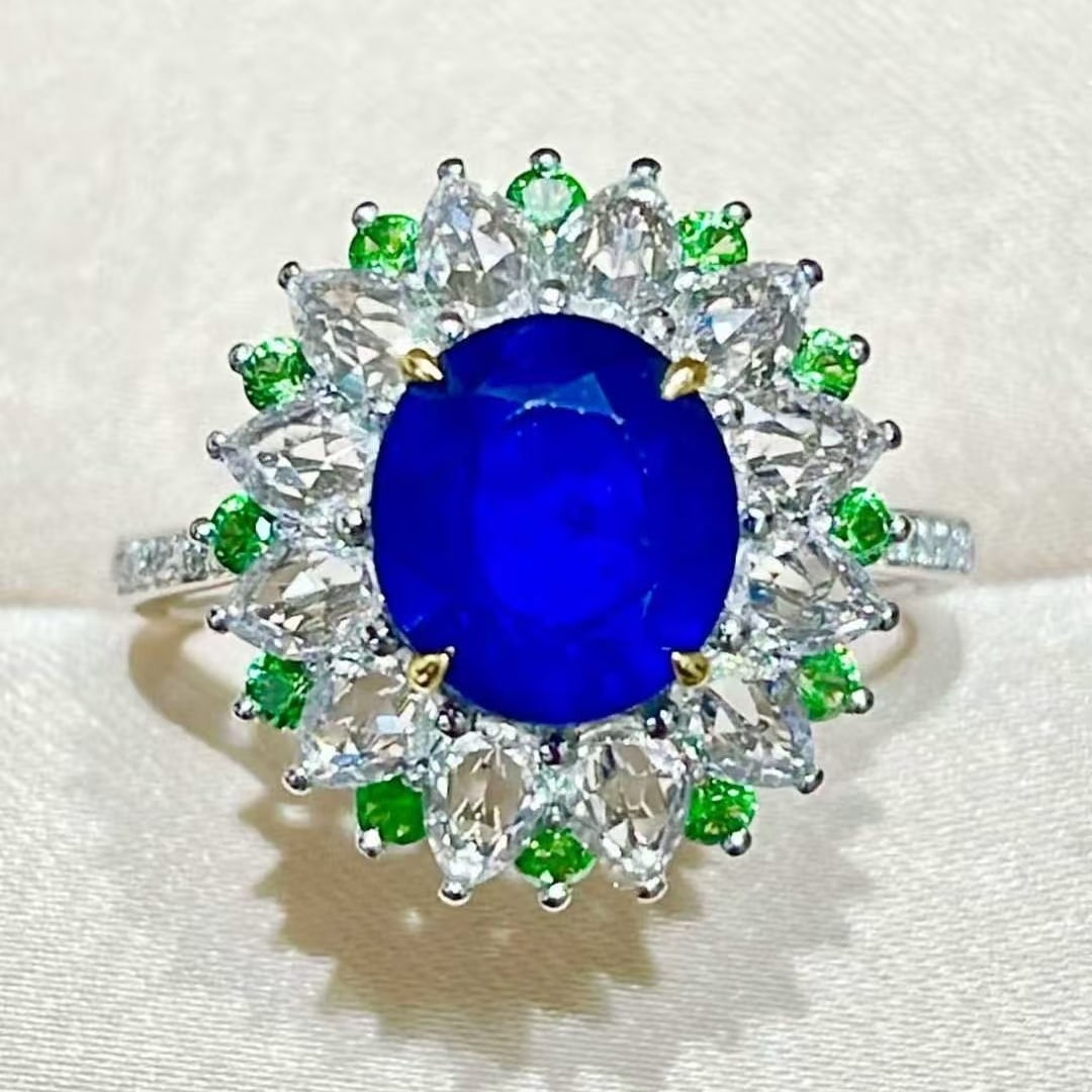 14k Gold 2.48 Ct Natural Sapphire & Diamond & Tsavorite Ring: Ref:231051181 // gold content:14k gold // ring size:7. 25us // // main gemstone:sapphire // shape:oval // carat weight:2. 48ct // color:royal blue // treatment:natural // // adjacent gemstone 2 :