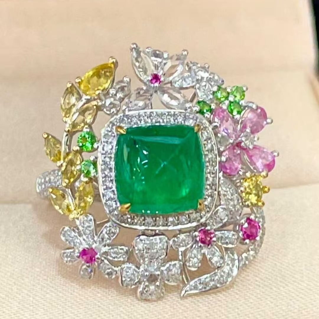14k Gold 2.80 Ctw Natural Emerald & Diamond Ring: Ref:231051185 // gold content:14k gold // ring size:7. 25us // // main gemstone:emerald // shape:sugar-loaf // carat weight:2. 35ct // color:green // treatment:natural // // adjacent gemstone 2 : diam
