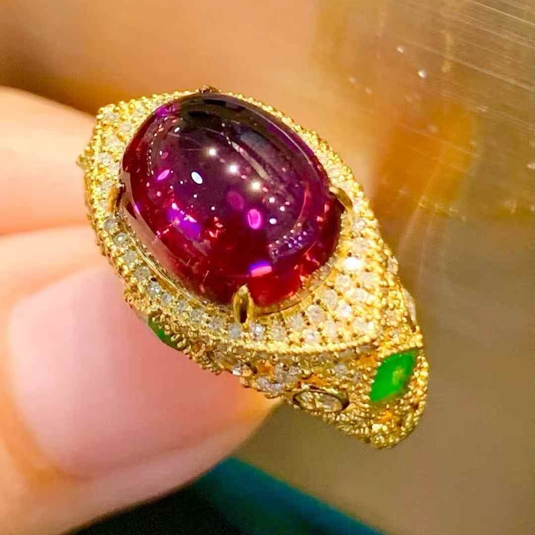 14k Gold 5.1 Ct Natural Tourmaline & Diamond Ring: Ref:231051205 // gold content:14k gold // ring size:7. 25us // // main gemstone:tourmaline // shape:oval // carat weight:5. 1ct // color:red // treatment:natural // // adjacent gemstone 2 : diamond //