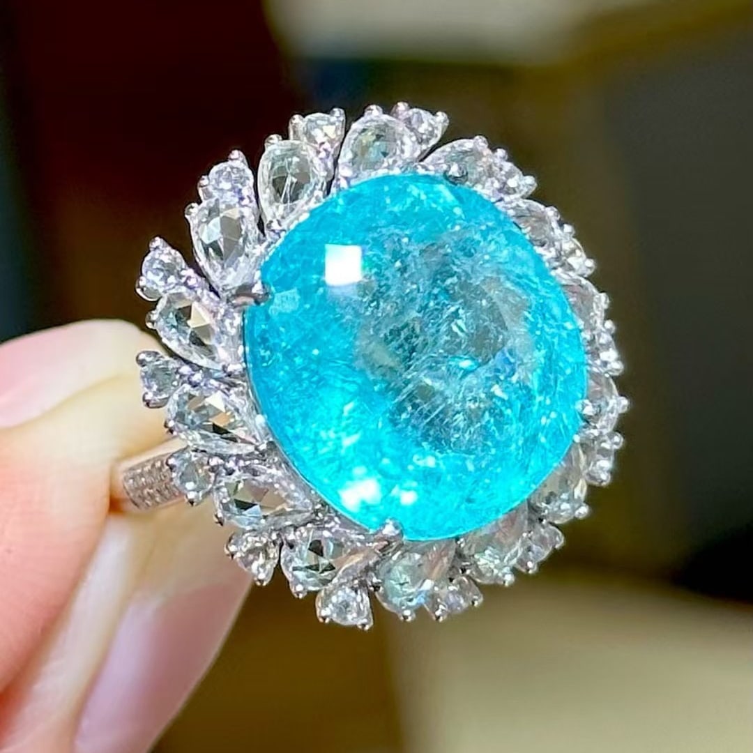 14k Gold 10.6 Ct Natural Paraiba Tourmaline & Sapphire & Diamond Ring: Ref:231051210 // gold content:14k gold // ring size:7. 25us // // main gemstone:paraiba tourmaline // shape:oval // carat weight:10. 6ct // color:blue // treatment:natural // // adjacent gemstone 2 : 