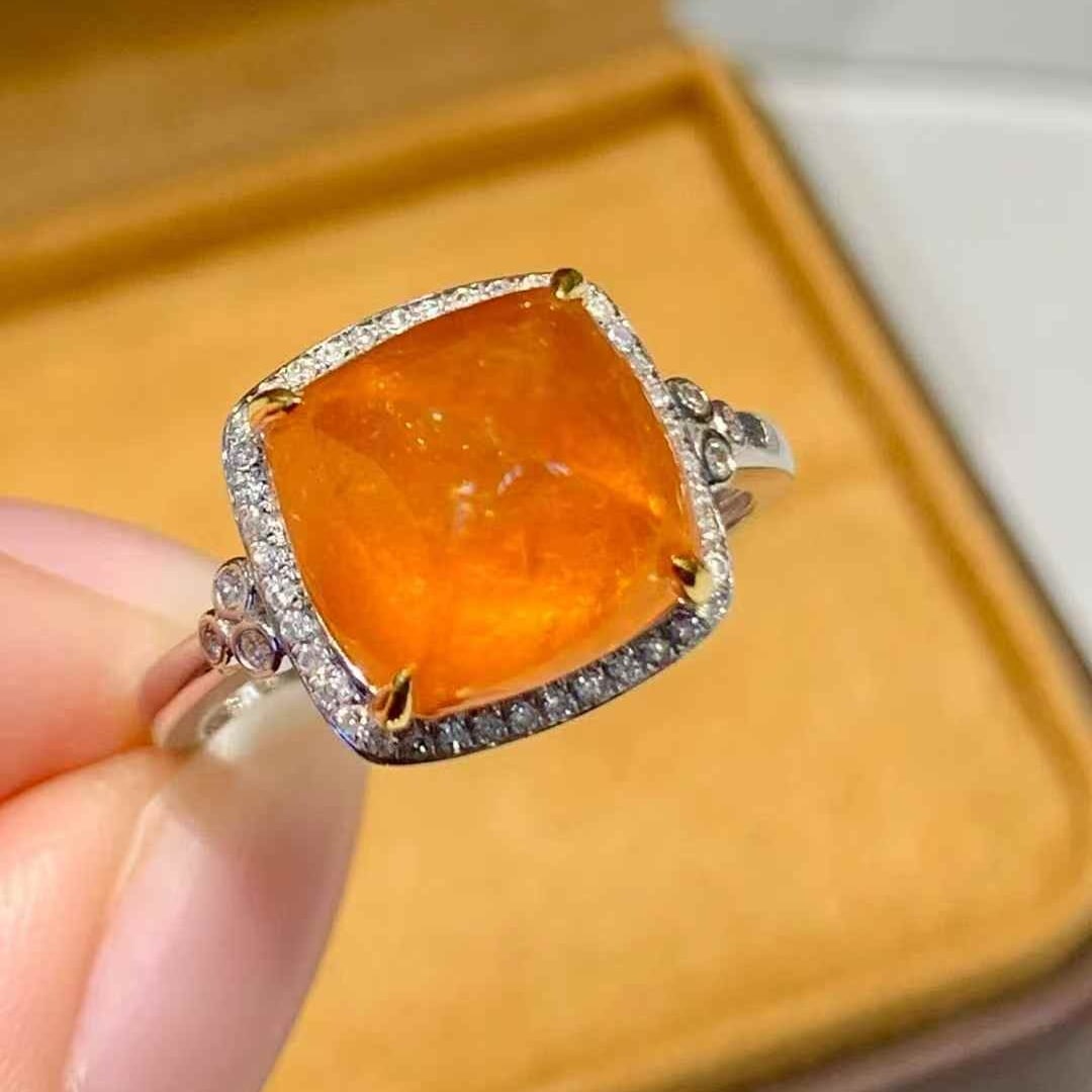 14k Gold 6.68 Ct Natural Spessartine & Diamond Ring: Ref:231051212 // gold content:14k gold // ring size:7. 25us // // main gemstone:spessartine // shape:sugar-loaf // carat weight:6. 68ct // color:orange // treatment:natural // // adjacent gemstone 2
