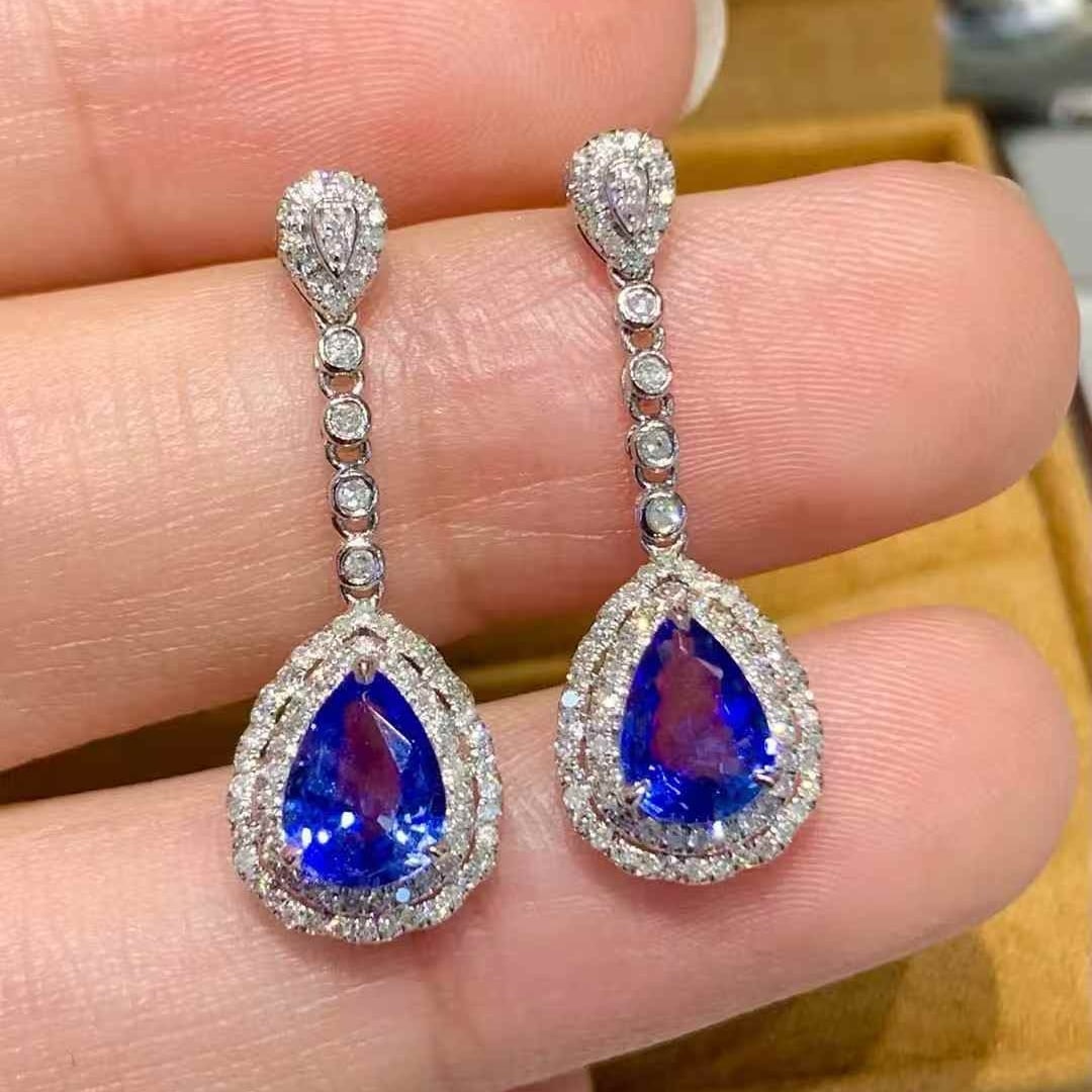 14k Gold 1.6 Ct Natural Sapphire & Diamond Earrings: Ref:231051222 // gold content:14k gold // main gemstone:sapphire // shape:pear // carat weight:1. 6ct // color:blue // treatment:natural // // adjacent gemstone 2 : diamond // shape:round // clarity
