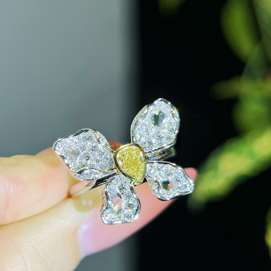 14k Gold 1.60 Ctw Natural Yellow Diamond & Diamond Ring: Ref:231051239 // gold content:14k gold // ring size:7. 25us // // main gemstone:yellow diamond // shape:pear // carat weight:0. 46ct // color:yellow // treatment:natural // // adjacent gemstone 2 :