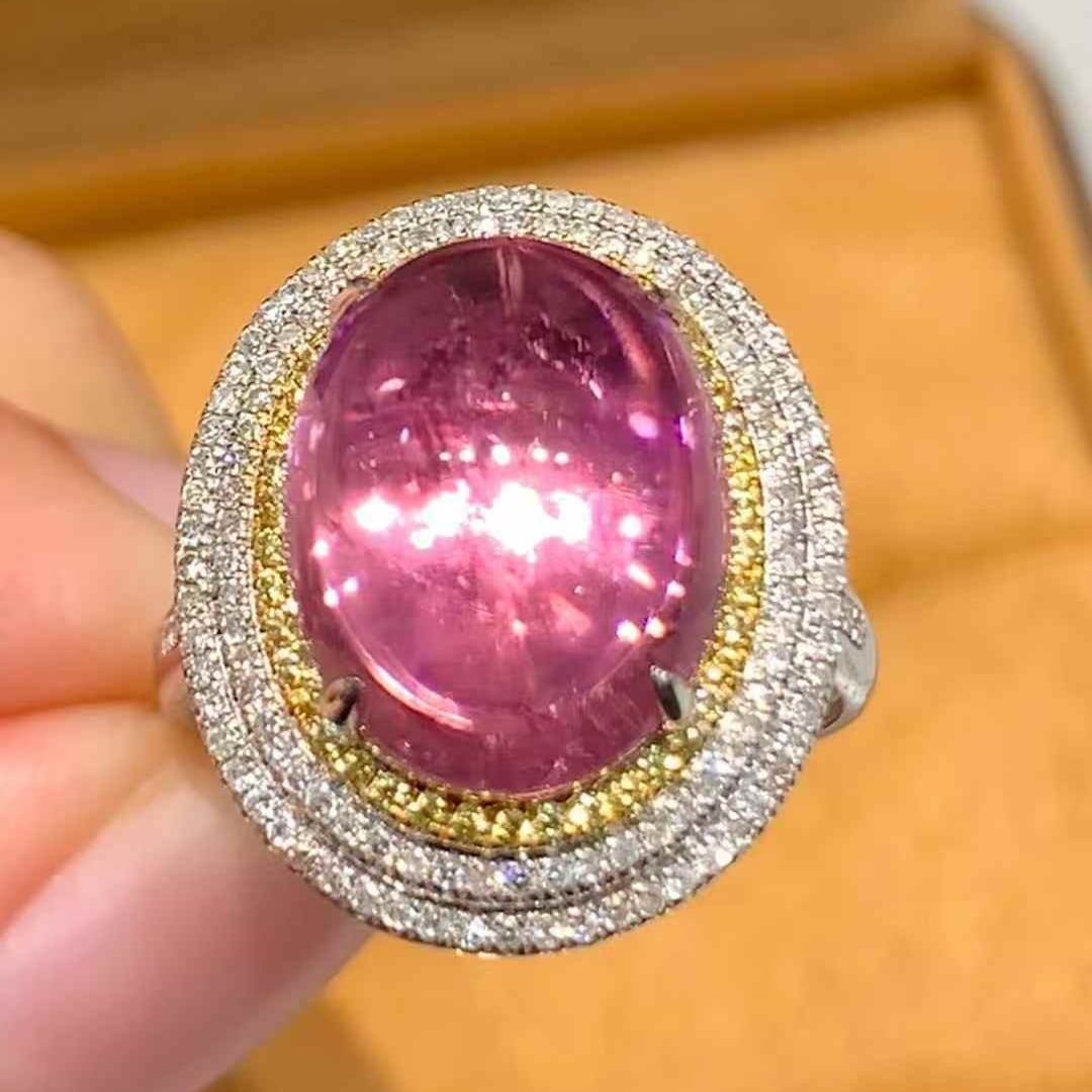 14k Gold 6.2 Ct Natural Tourmaline & Diamond Ring: Ref:231051243 // gold content:14k gold // ring size:7. 25us // // main gemstone:tourmaline // shape:oval // carat weight:6. 2ct // color:pink // treatment:natural // // adjacent gemstone 2 : diamond