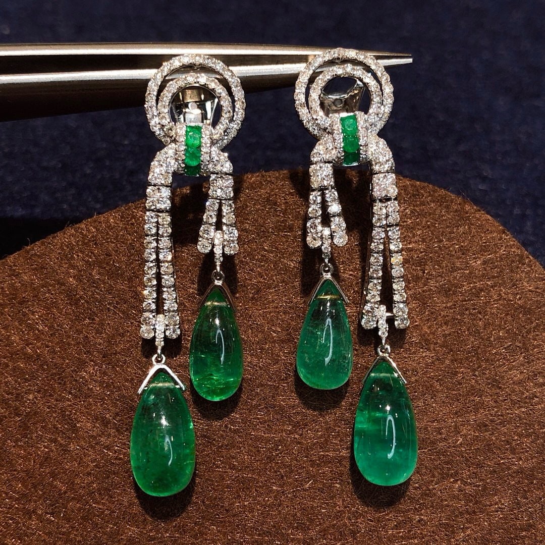 14k Gold 11.81 Ctw Vivid Green Natural Emerald & Diamond Earrings: Ref:231052007 // gold content:14k gold // main gemstone:emerald // shape:pear // carat weight:10. 70ct // color:vivid green // treatment:natural // // adjacent gemstone 2 : diamond // shape:round // c
