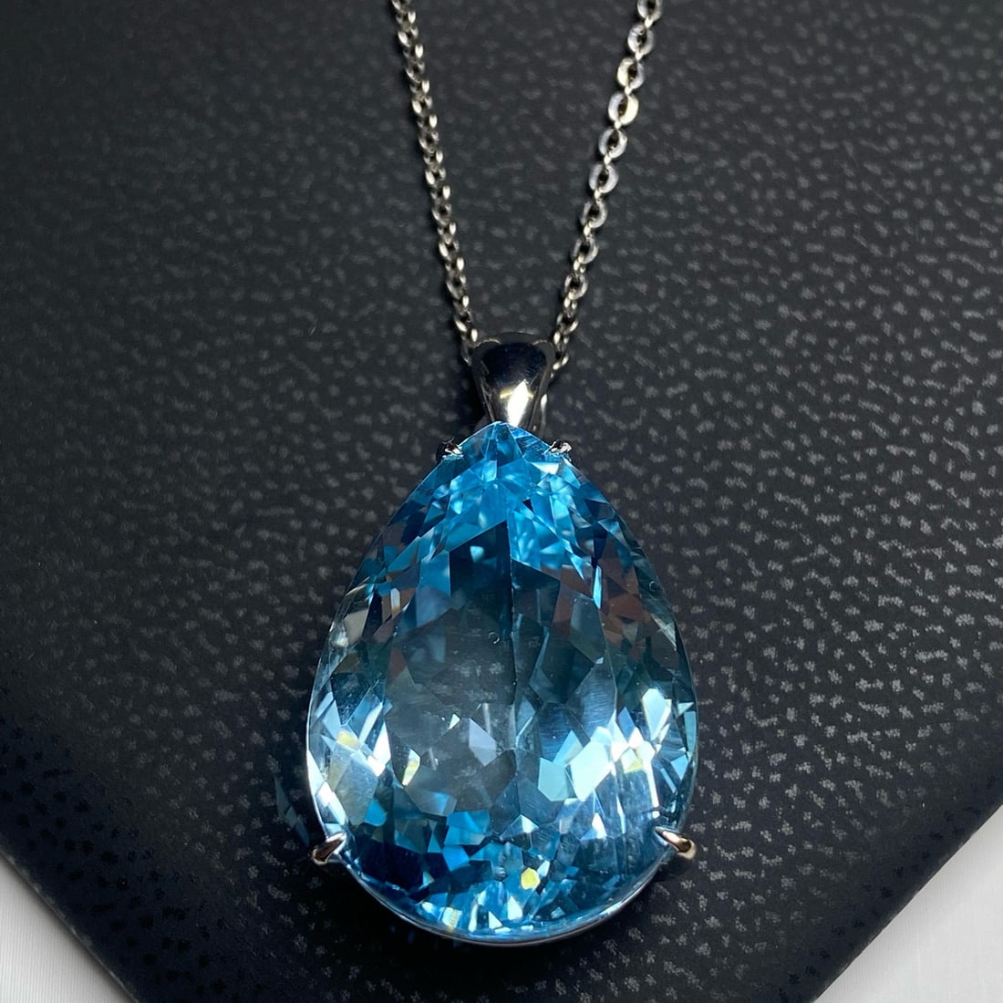 14k Gold 40.10 Ct Natural Topaz Pendant( Without Chain ): Ref:231052019 // gold content:14k gold // main gemstone:topaz // shape:pear // carat weight:40. 10ct // color:blue // treatment:natural // Condition: New Low Estimate: 4200.00 High Estimate: 6300.00