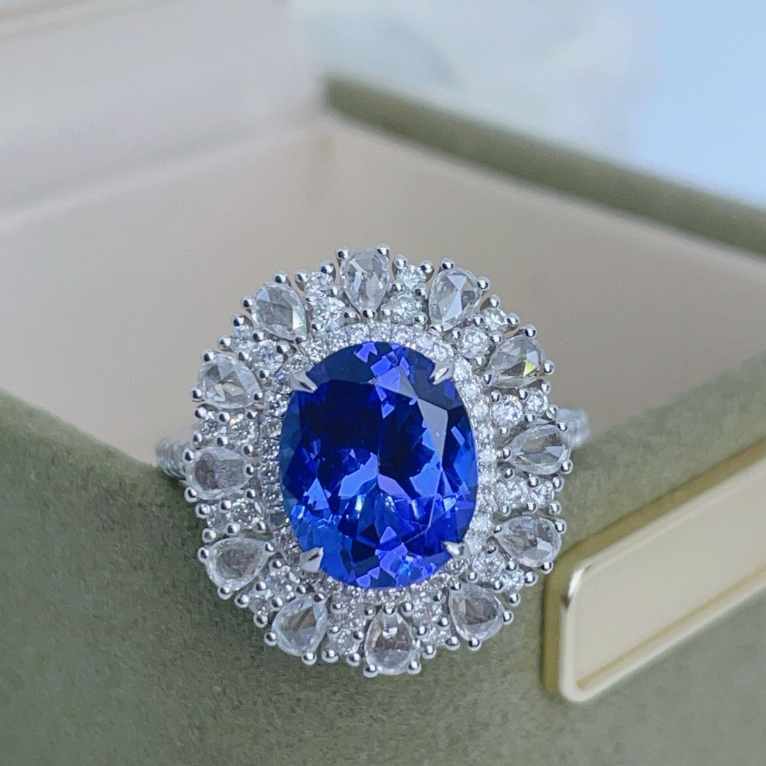 14k Gold 4.43 Ctw Natural Tanzanite & Diamond Ring: Ref:231052034 // gold content:14k gold // ring size:7. 25us // // main gemstone:tanzanite // shape:oval // carat weight:3. 15ct // color:blue // treatment:natural // // adjacent gemstone 2 : diamond /