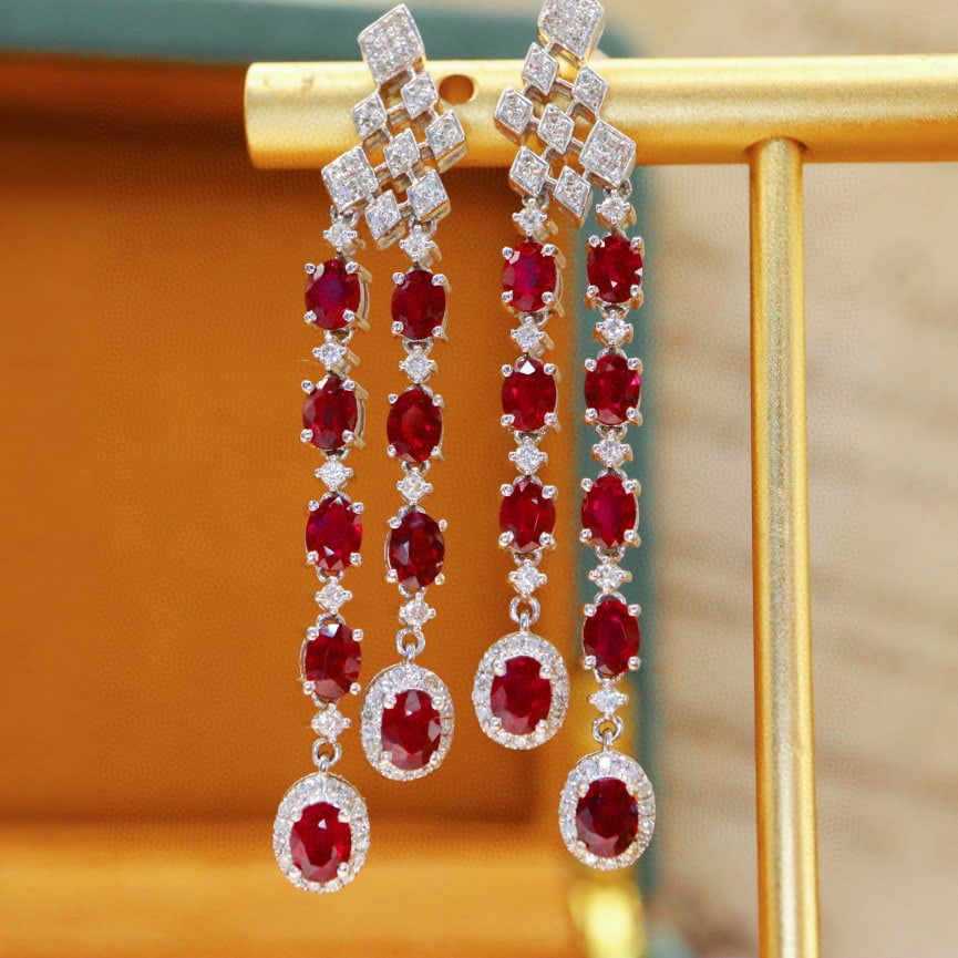 14k Gold 4.33 Ctw Natural Ruby & Diamond Earrings: Ref:231052096 // gold content:14k gold // main gemstone:ruby // shape:oval // carat weight:3. 8ct // color:pigeonblood red // treatment:natural // // adjacent gemstone 2 : diamond // number of stones: