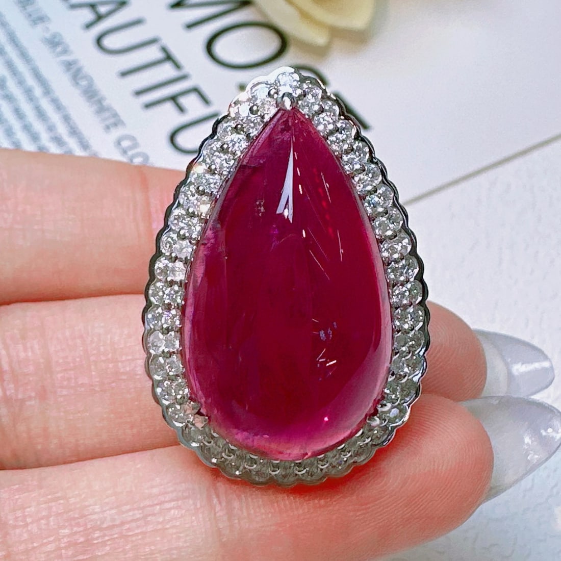 14k Gold 21 Ct Natural Tourmaline & Diamond Ring: Ref:231052114 // gold content:14k gold // ring size:7. 25us // // main gemstone:tourmaline // shape:pear // carat weight:21ct // color:red // treatment:natural // // adjacent gemstone 2 : diamond //