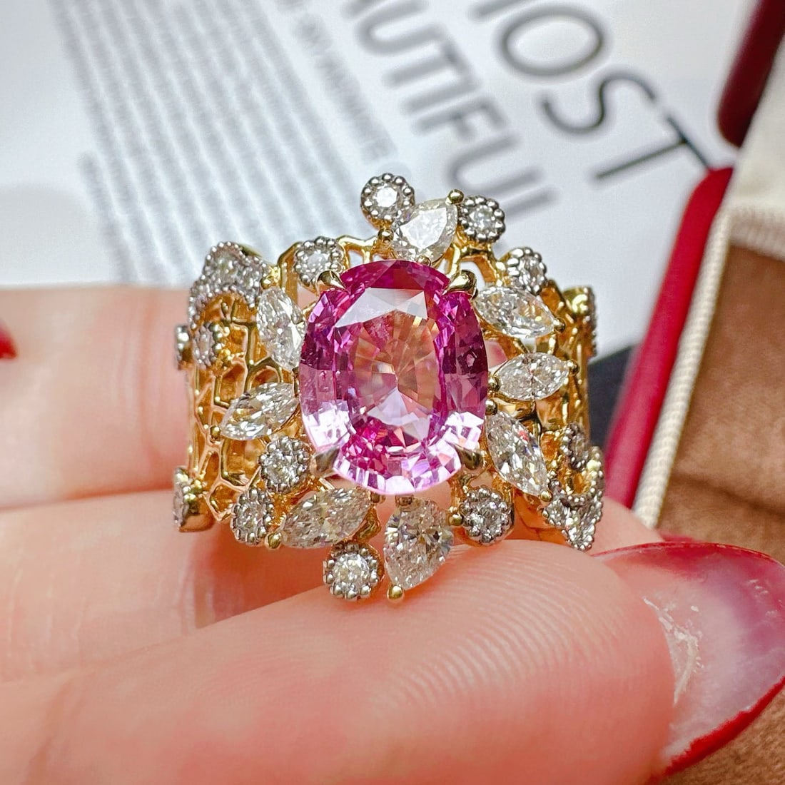 14k Gold 2.83 Ctw Natural Padparadscha Sapphire & Diamond Ring: Ref:231052119 // gold content:14k gold // ring size:7. 25us // // main gemstone:padparadscha sapphire // shape:oval // carat weight:2. 05ct // color:orangish pink // treatment:natural // // adjacent