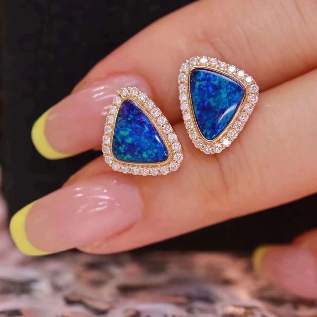 14k Gold 2.91 Ctw Natural Opal & Diamond Earrings: Ref:231052120 // gold content:14k gold // main gemstone:opal // shape:triangle // carat weight:2. 52ct // color:blue // treatment:natural // // adjacent gemstone 2 : diamond // shape:round // carat we