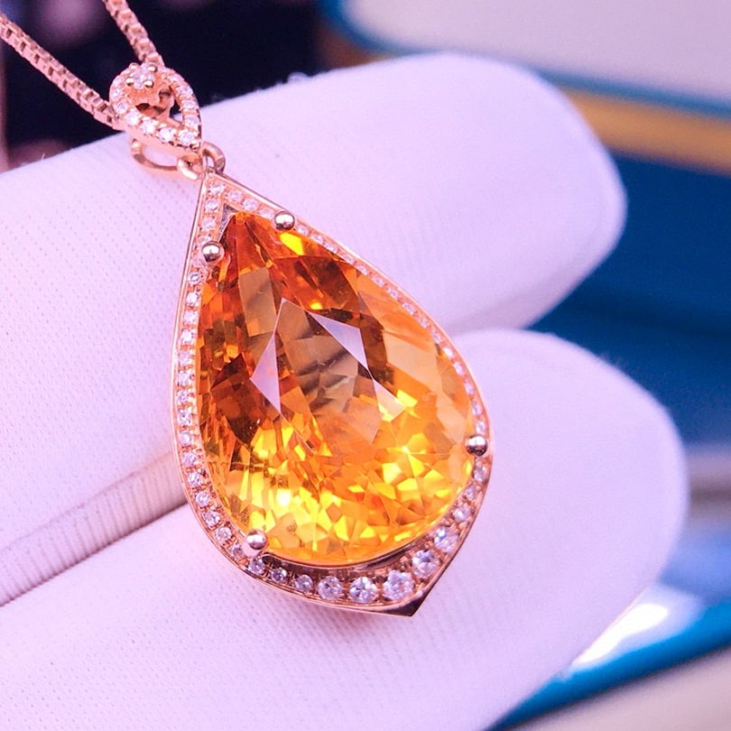 14k Gold 9 Ct Natural Citrine & Diamond Pendant( Without Chain ): Ref:231052125 // gold content:14k gold // main gemstone:citrine // shape:pear // carat weight:9ct // color:yellow // treatment:natural // // adjacent gemstone 2 : diamond // shape:round // clarity