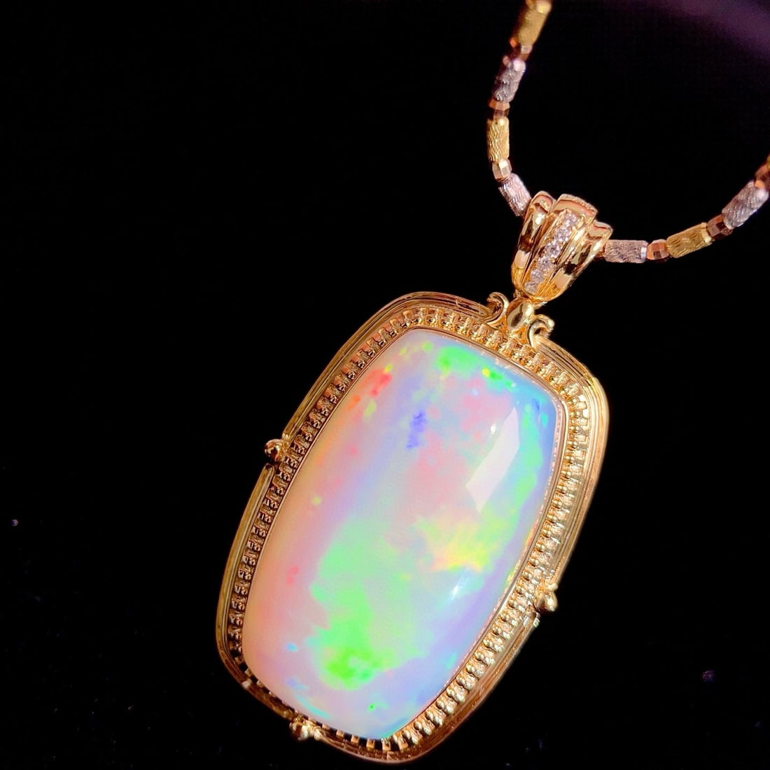 14k Gold 36.73 Ctw Natural Opal & Diamond Pendant( Without Chain ): Ref:231052128 // gold content:14k gold // main gemstone:opal // shape:cushion // carat weight:36. 7ct // color:color // treatment:natural // // adjacent gemstone 2 : diamond // shape:round // carat we