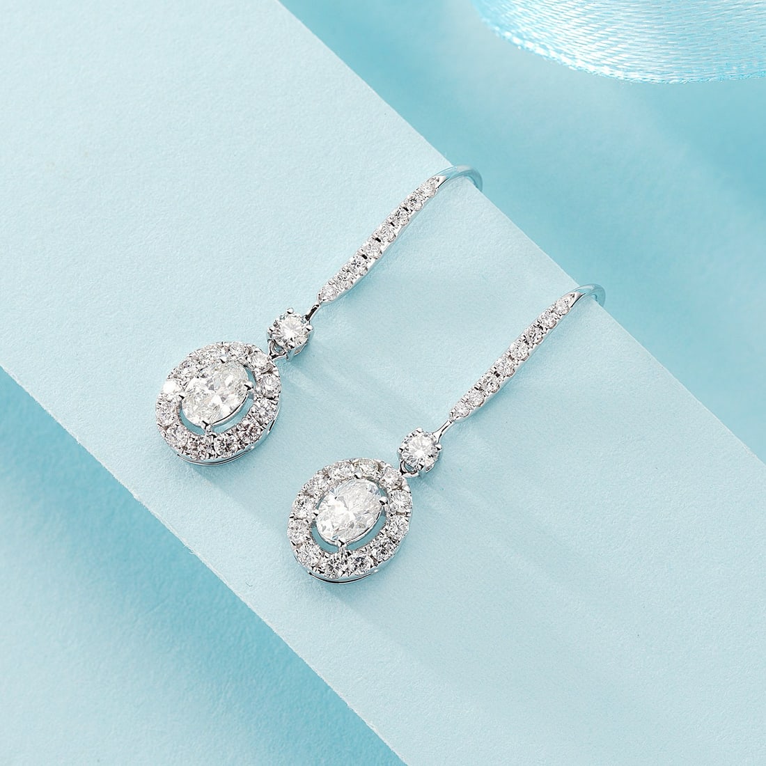 14k Gold 1.06 Ctw Natural H Diamond Earrings: Ref:231052144 // gold content:14k gold // main gemstone:diamond // shape:oval // carat weight:0. 48ct // clarity grade:vs-si // color:h // treatment:natural // // adjacent gemstone 2 : diamond // shap