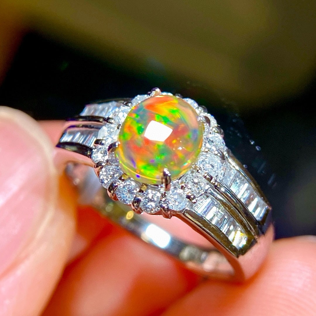14k Gold 1.69 Ctw Natural Opal & Diamond Ring: Ref:231052148 // gold content:14k gold // ring size:7. 25us // // main gemstone:opal // shape:oval // carat weight:1. 18ct // color:color // treatment:natural // // adjacent gemstone 2 : diamond // sh