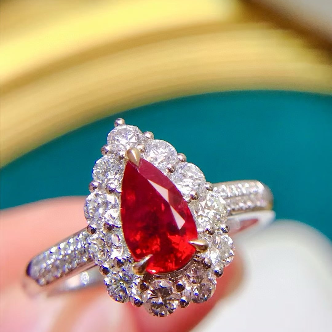 14k Gold 1.89 Ctw Natural Ruby & Diamond Ring: Ref:231052156 // gold content:14k gold // ring size:7. 25us // // main gemstone:ruby // shape:pear // carat weight:1. 03ct // color:pigeonblood red // treatment:natural // // adjacent gemstone 2 : dia