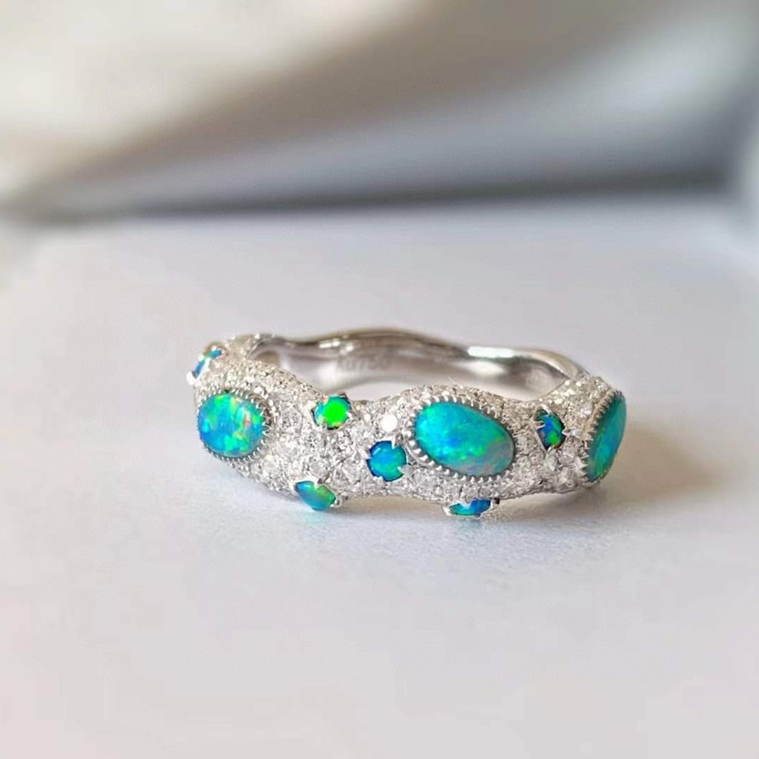 14k Gold 1.7 Ctw Natural Opal & Diamond Ring: Ref:231052176 // gold content:14k gold // ring size:7. 25us // // main gemstone:opal // shape:multiply // carat weight:0. 8ct // color:color // treatment:natural // // adjacent gemstone 2 : diamond //