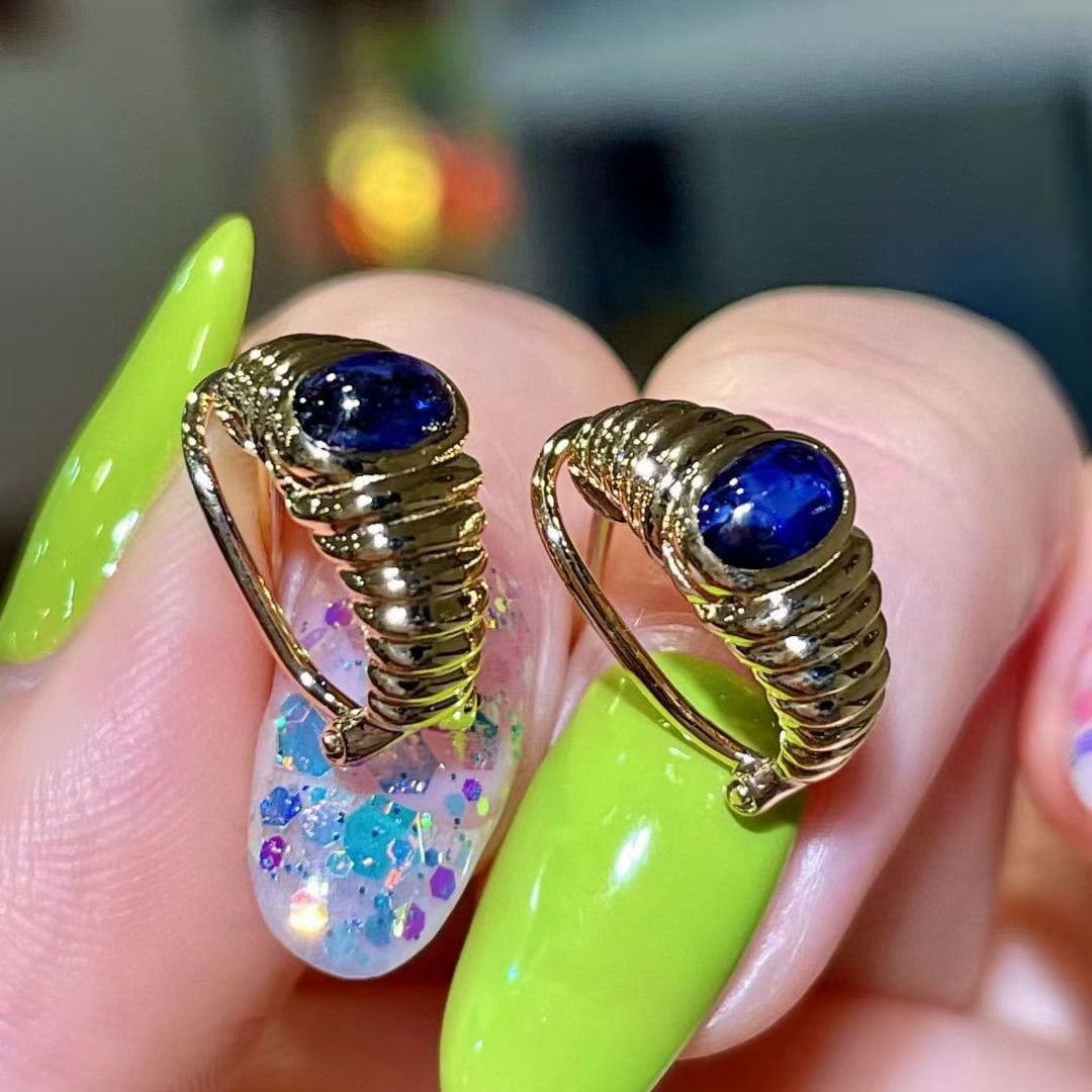 14k Gold 1.27 Ct Natural Sapphire Earrings: Ref:231052187 // gold content:14k gold // main gemstone:sapphire // shape:oval // carat weight:1. 27ct // color:blue // treatment:natural // Condition: New Low Estimate: 4400.00 High Estimate: 6600.00